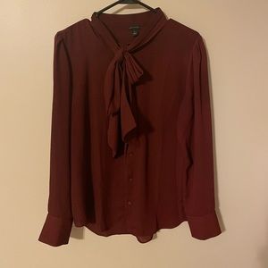 Burgundy Ann Taylor tie neck blouse size medium.